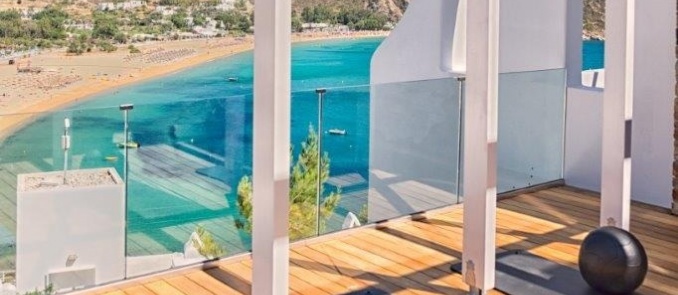 Fitness with the priceless view of Mylopotas on Ios island